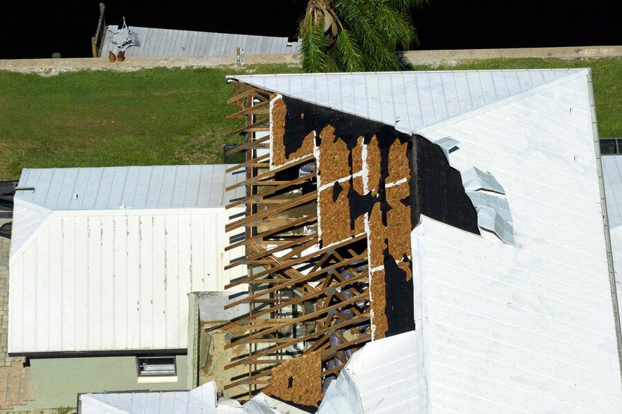 hurricane-ian-destroyed-house-roof-florida-residential-area-natural-disaster-its-consequences_127089-25966 roof damages due disaster